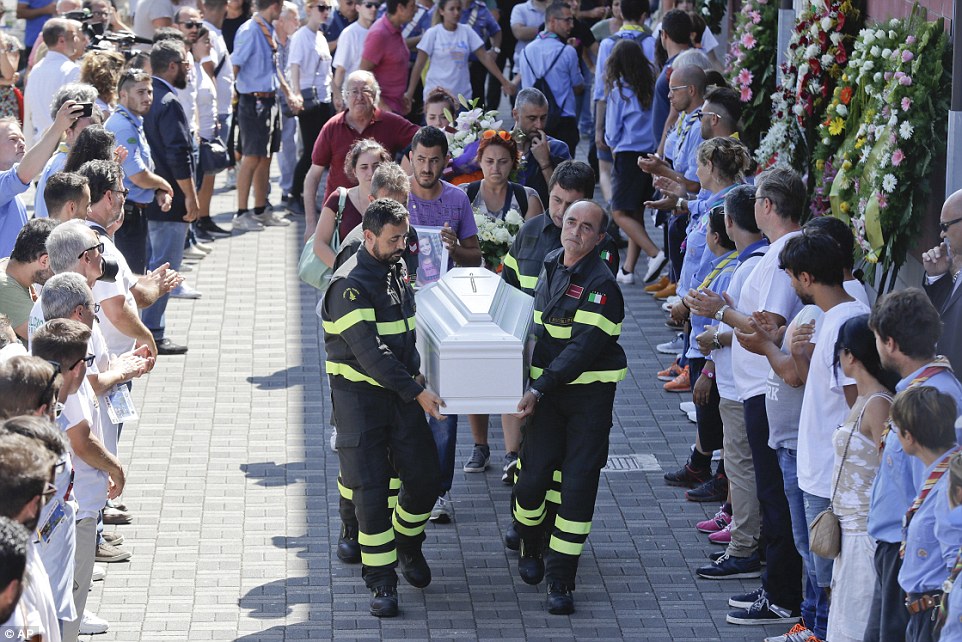 37A037B300000578 3761240 The coffin of 9 year old Giulia Rinaldo is carried outside the g a 36 1472319383161