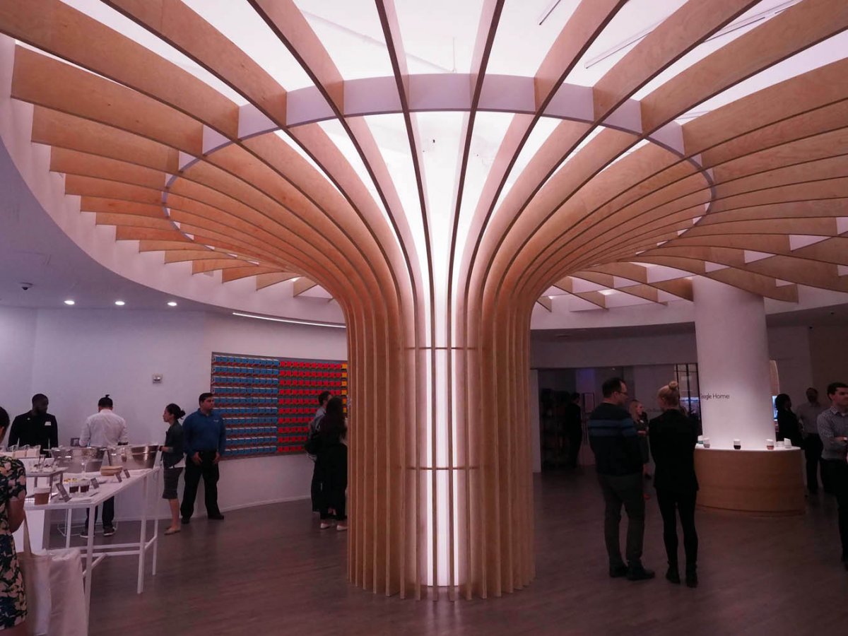 the first thing youll notice when you walk in is this massive wooden fountain of light