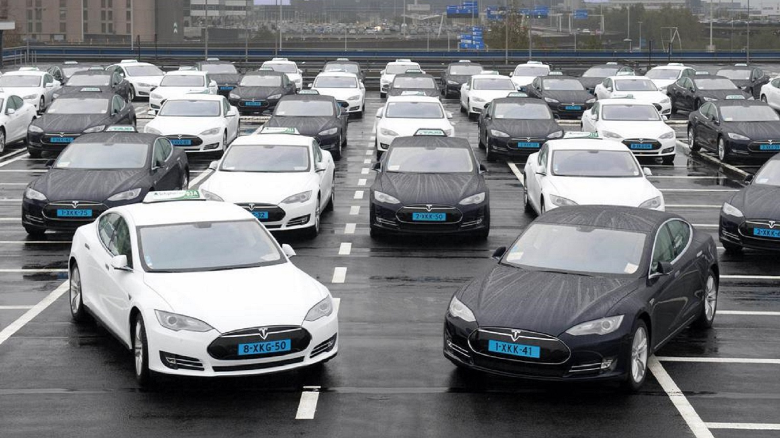 amsterdam airport tesla taxi